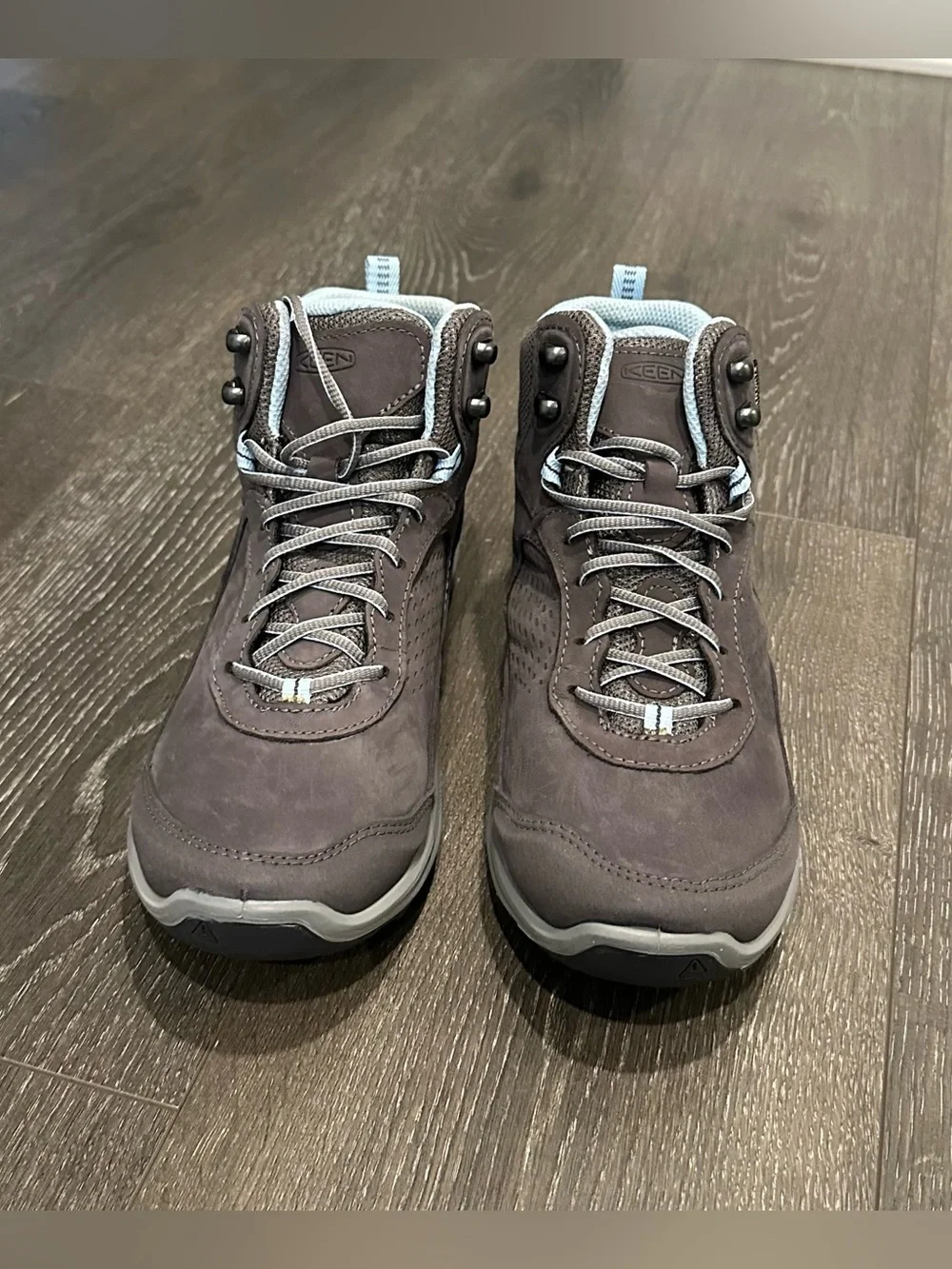 KEEN Gray Lace-Up Women's Hiking Boots with Light Blue Lining.